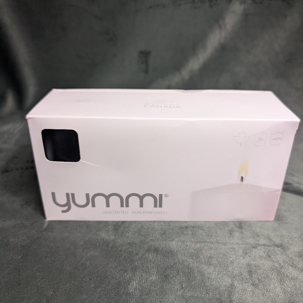 NWT Yummi 3x4 Black Pillar Candles 3 pack 40 hours. Clean Burning. MSRP $28